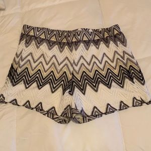 Black, white, and gold stretchy shorts